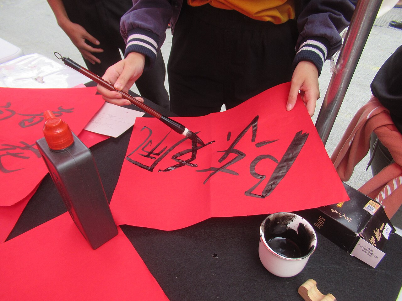 Chinese calligraphy, the art behind New Year couplets and greetings