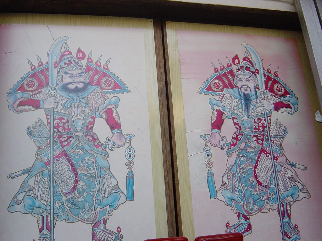 A painted door god (menshen) guarding a home