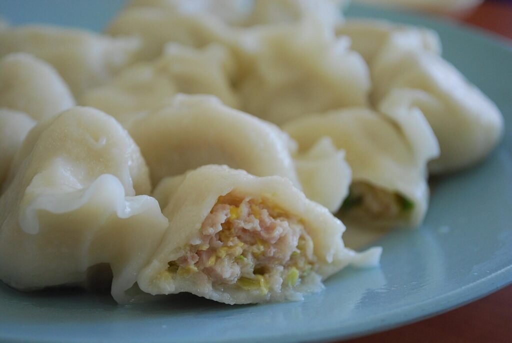 The pork filling inside a Chinese dumpling