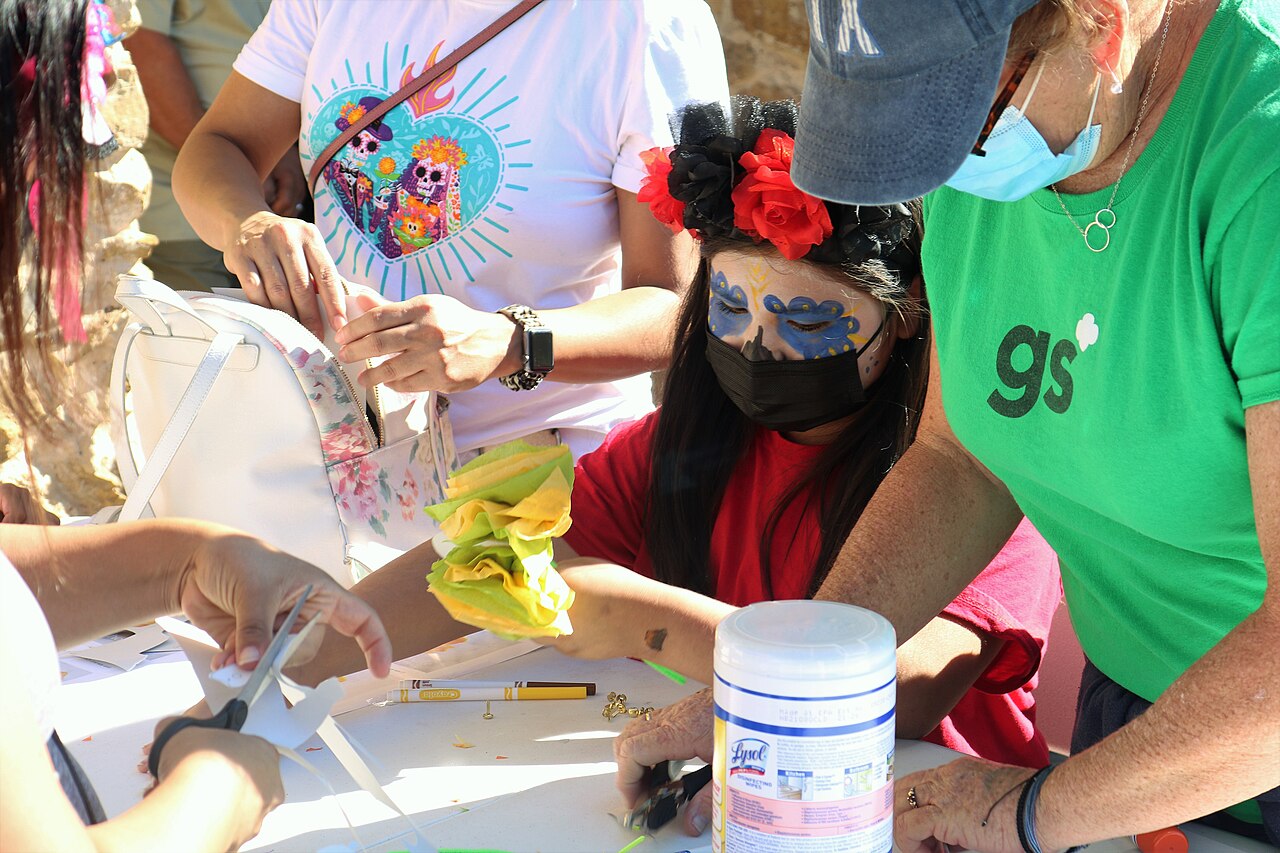 A family making crafts together at a table