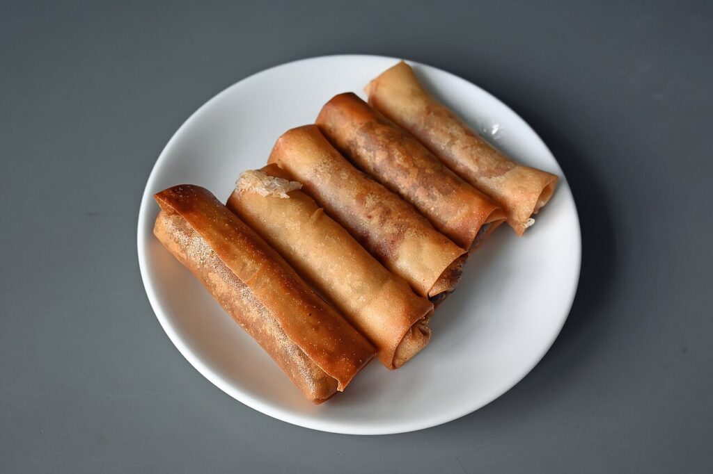 Fried spring rolls, golden like bars of gold