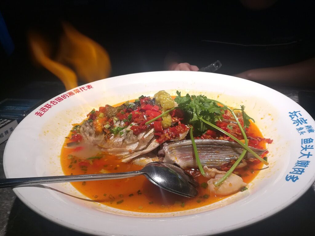 A whole steamed fish, the most important lucky New Year dish