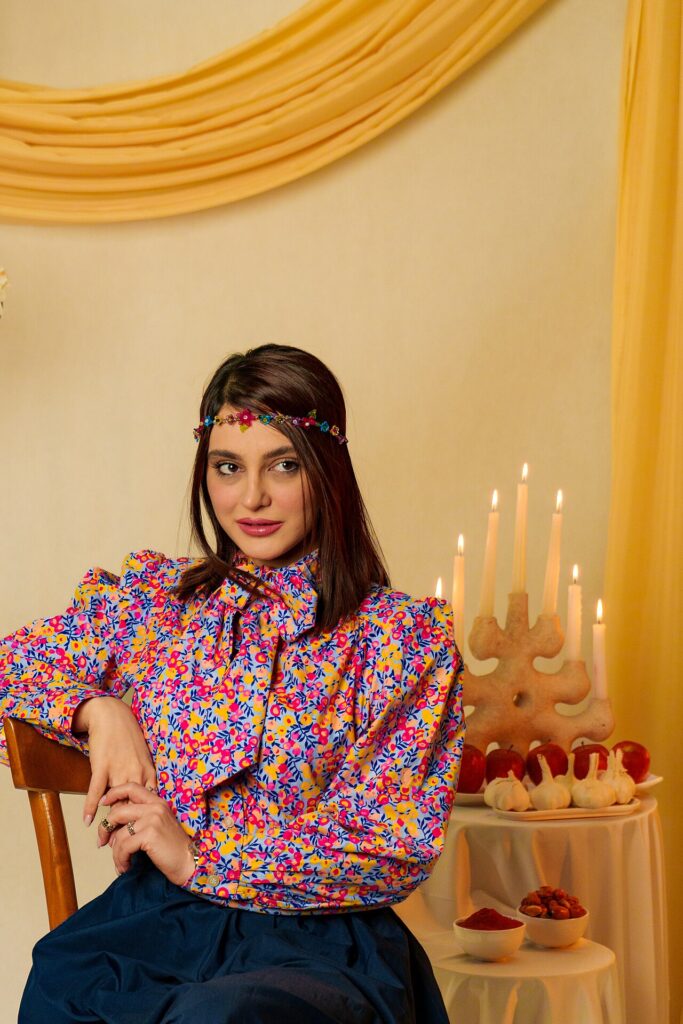 A Female Model Sitting Beside a Haft-Sin Table 2025 03