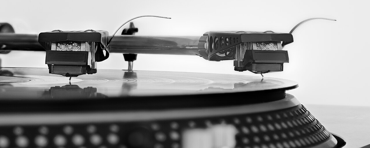 A record needle on a vinyl record, for a Valentine's playlist