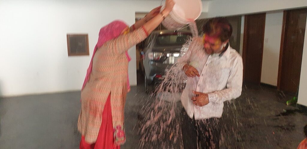 Holi Festival of Colours, the festival of bonding, the festival of emotions. People playing with colourful water