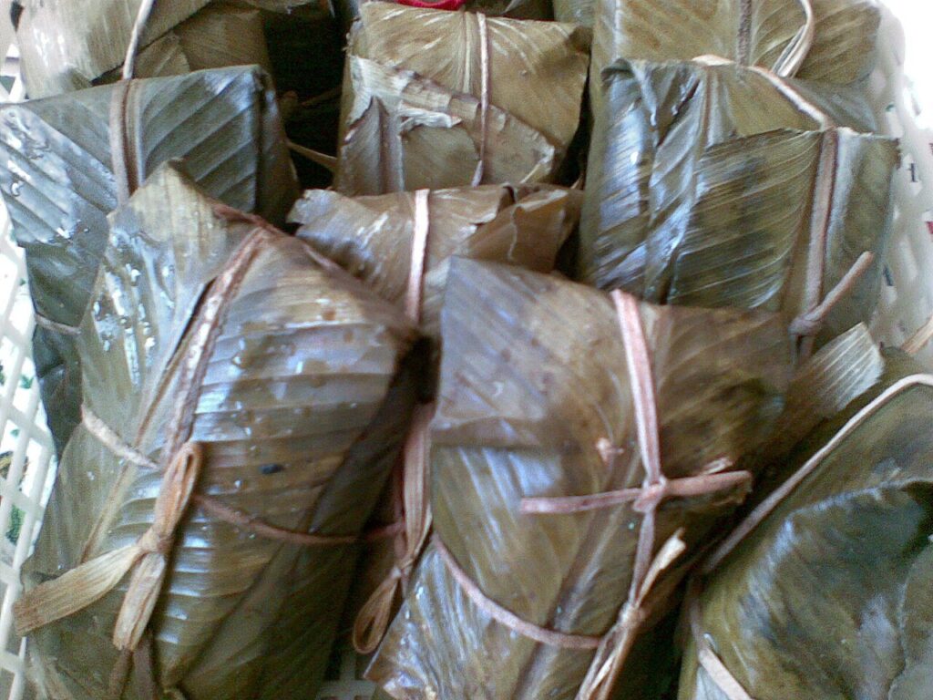 Wrapped corn husk tamales