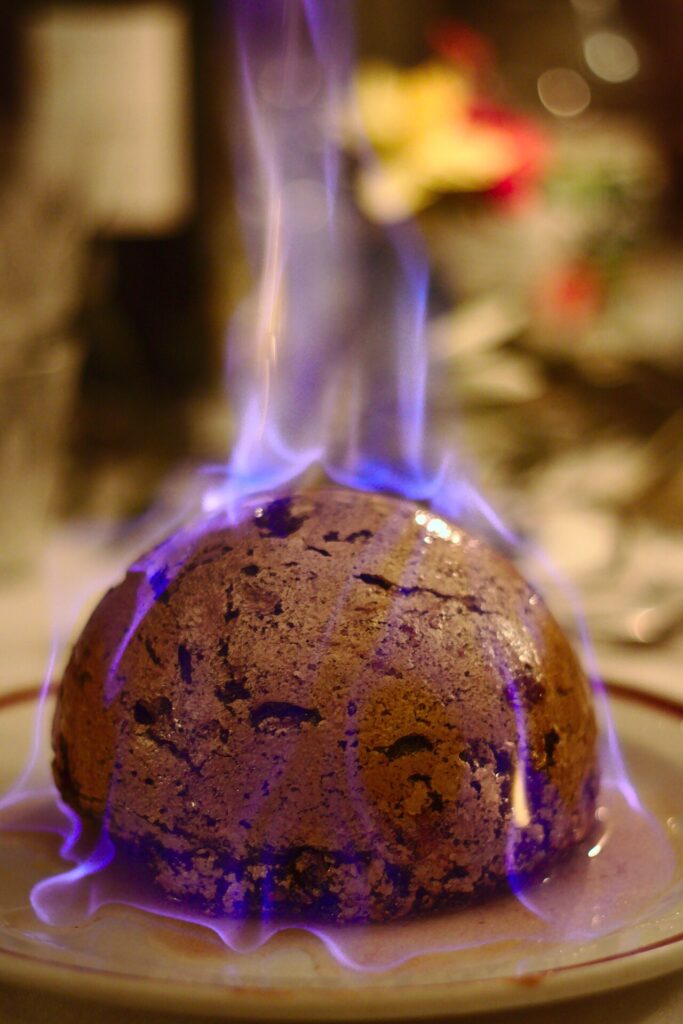 A flaming Christmas pudding