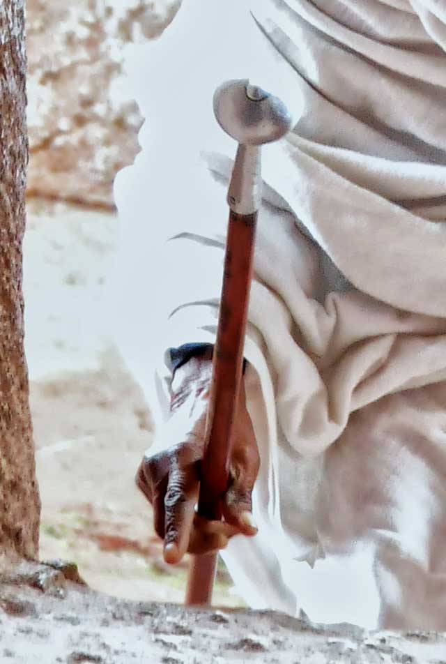A white-robed Ethiopian Orthodox pilgrim at Lalibela